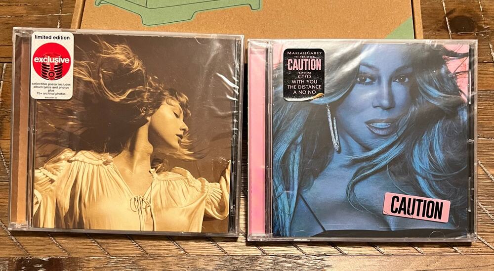 Taylor Swift Fearless Mariah Carey Caution CD’s Brand New Sealed Cracked Case
